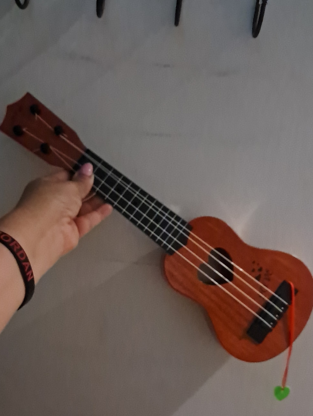 Kid-Friendly Wooden Ukulele in Brown with Heart Charm